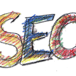The letters "SEO" drawn in a colorful, crayon-like style on a white background.