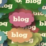 Multiple cloud-shaped labels, each containing the word 'blog', emphasize the concept of blogging.